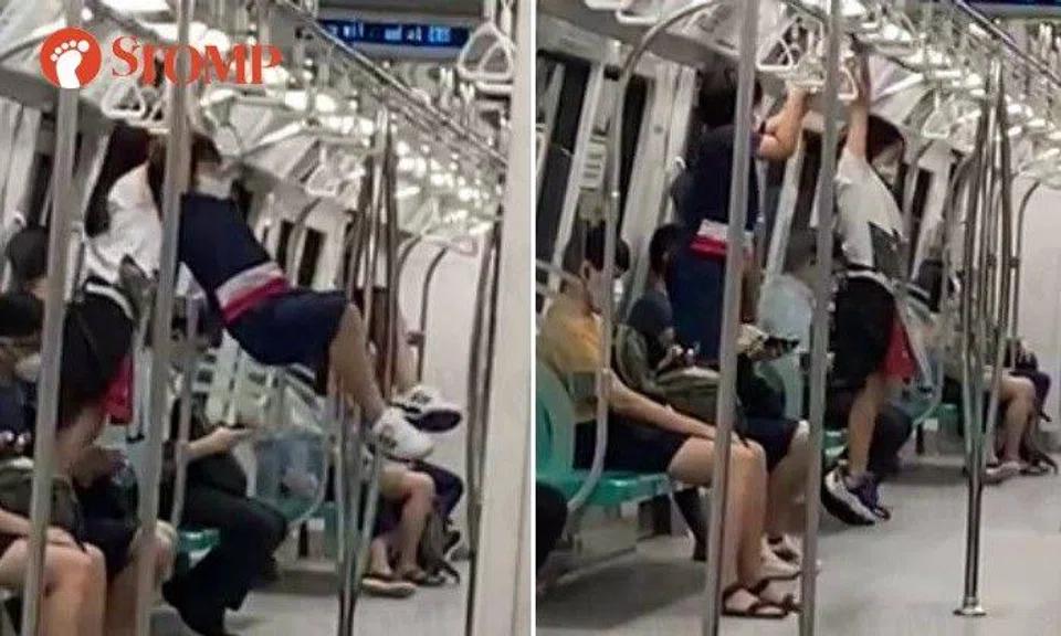 A Stomper submitted a video of a boy and a girl swinging from the handrail on a train heading towards Tuas Link.
