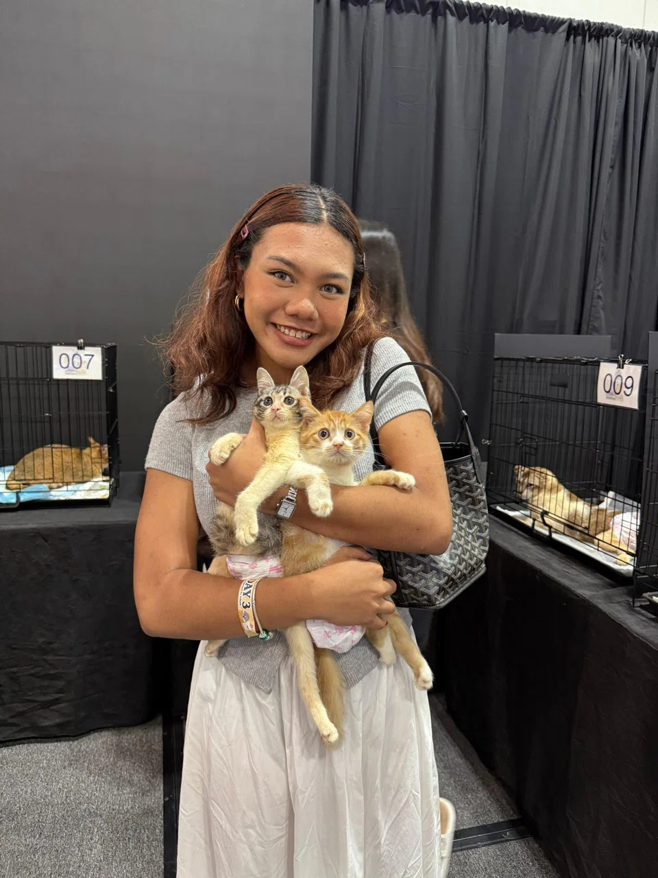 Ms Julie Chong's daughter Aqilah with Yoona (left) and Mika.