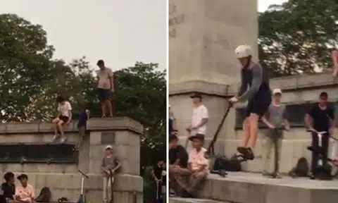 Scooter riders perform stunts and climb parapet at The Cenotaph, treating it like a "skate park"