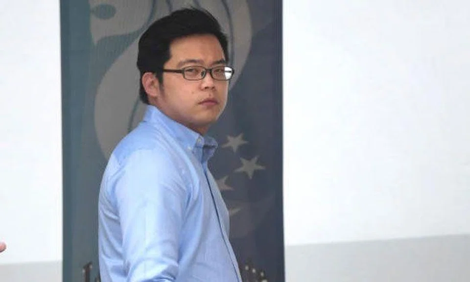 Jimson Zheng Jun Cheng was caught in the act at Tiong Bahru MRT station. TNP PHOTO: KUA CHEE SIONG