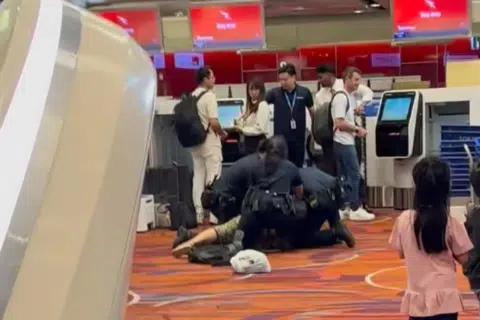 Woman arrested at Changi Airport check-in area for abusing public servant