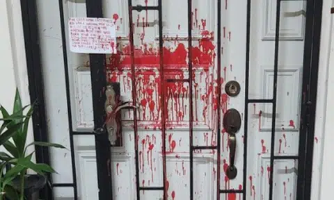 Man nabbed for loanshark harassment: Jurong West unit splashed with red paint, had debtor's note