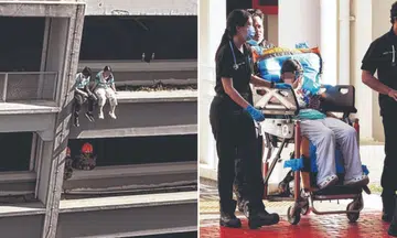 two girls sitting on seventh storey carpark ledge in toa payoh