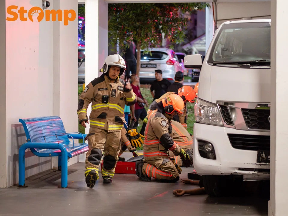 Man trapped under van in Bedok North void deck