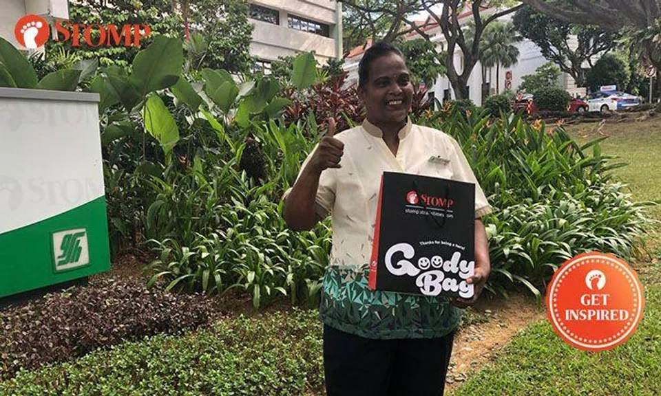 SGH housekeeper who helped carry elderly man down overhead bridge gets Stomp Goody Bag