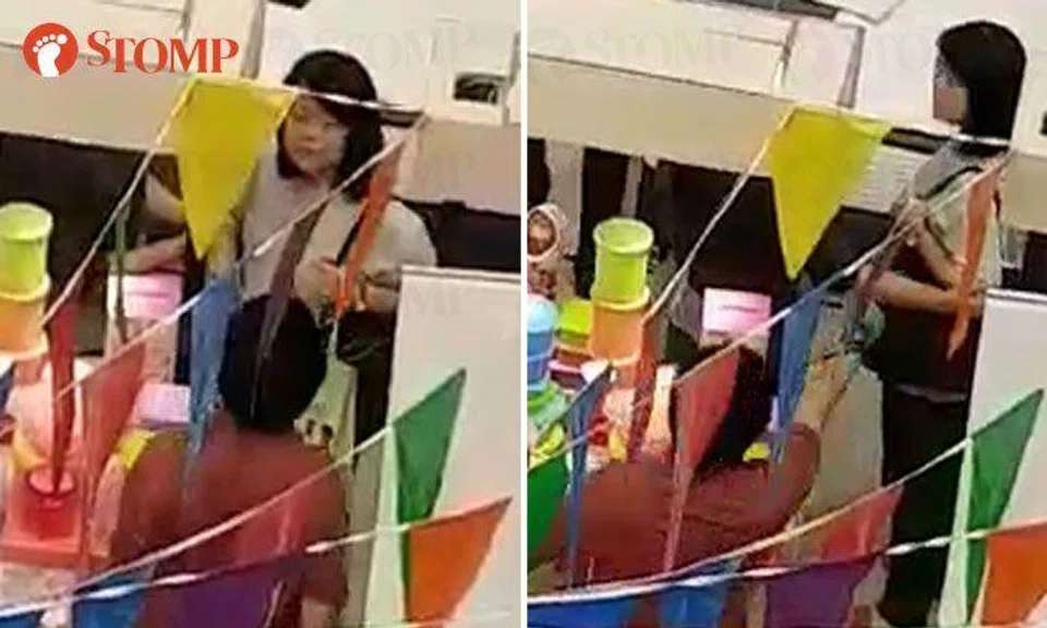 Salesman at Bedok Mall shouts at woman -- then uses vulgarity and gestures at her