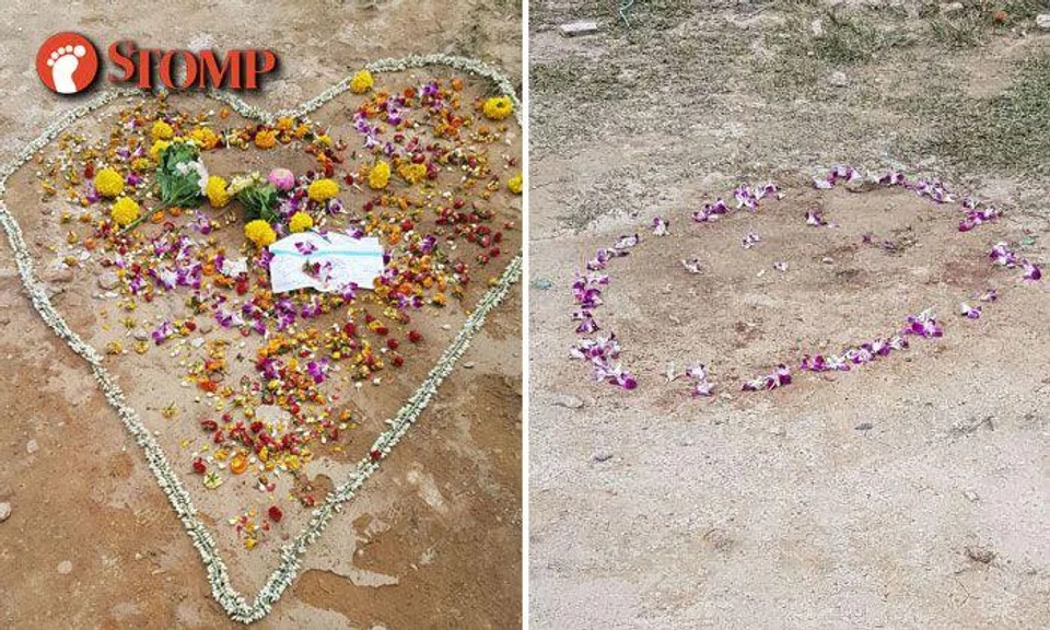 Flowers placed in tribute for TP officer who died in the line of duty at Serangoon Rd accident site