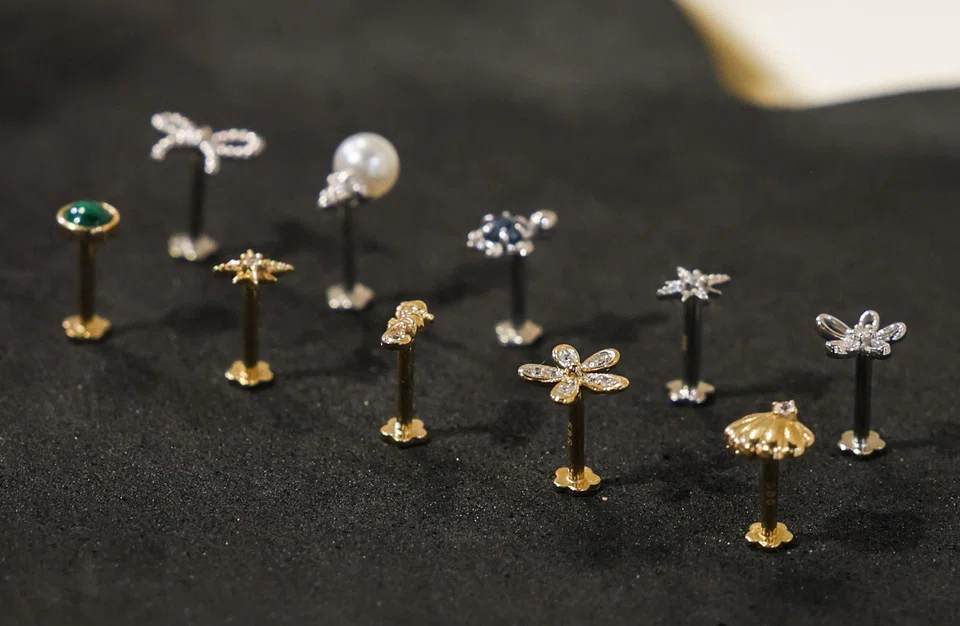 J&Co's 14K solid gold flatback earrings in yellow and white gold.