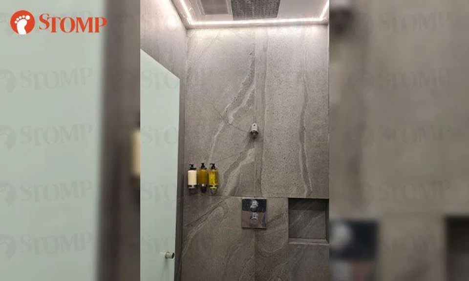 Woman sees iPhone hovering above cubicle door while showering at Virgin Active, police investigating
