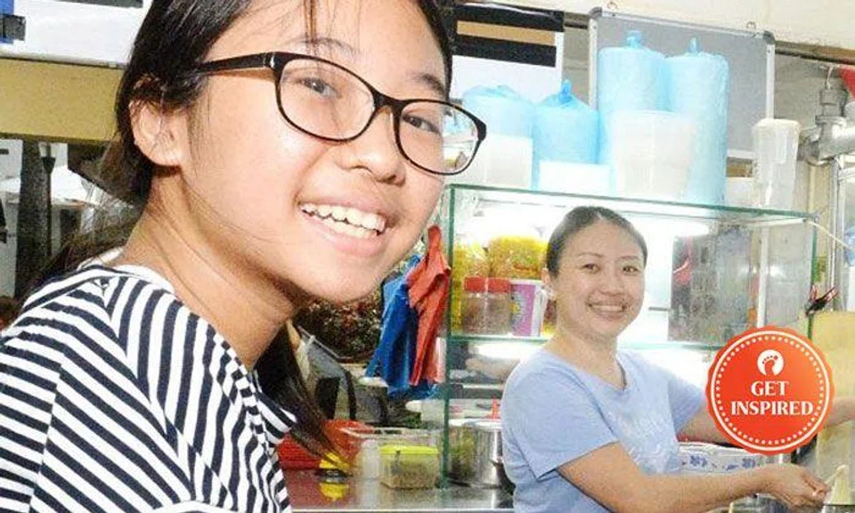 Ms Liang Baoyi (right) said that her daughter (left) always takes time to help out at the stall. 