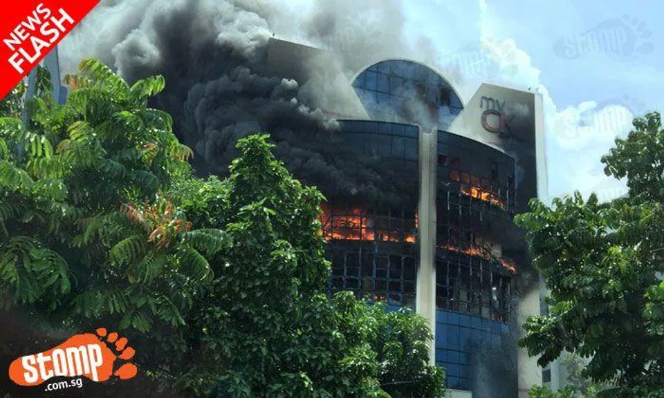 BREAKING NEWS: Huge fire engulfs several levels of CK building in Tampines