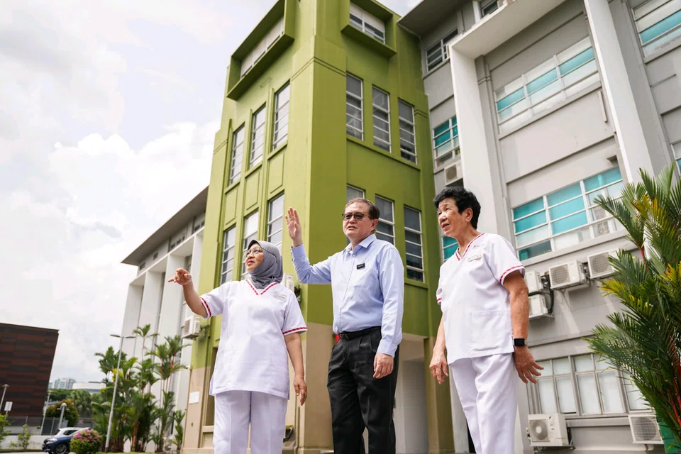 (From left) Ms Saleha Kamsan, Professor Tan Kok Hian and Ms Too Ah Kim recounting their memories on the grounds of the former Kandang Kerbau Hospital.