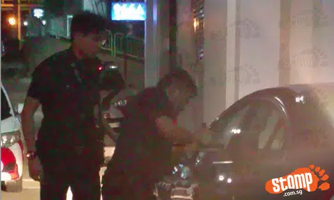 Police smash car window in Hougang, unconscious driver arrested for drink driving