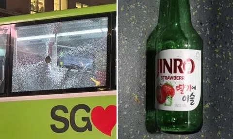 Man, 38, arrested for throwing soju bottle through bus window from pedestrian walkway at Orchard Road