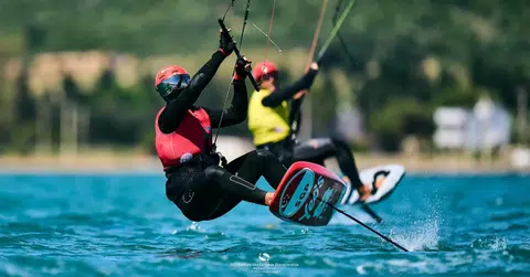 Singapore's Maximilian Maeder (in red vest) retaining his Formula Kite European Championships crown after defeating Riccardo Pianosi (in yellow vest) in the medal series on May 19.