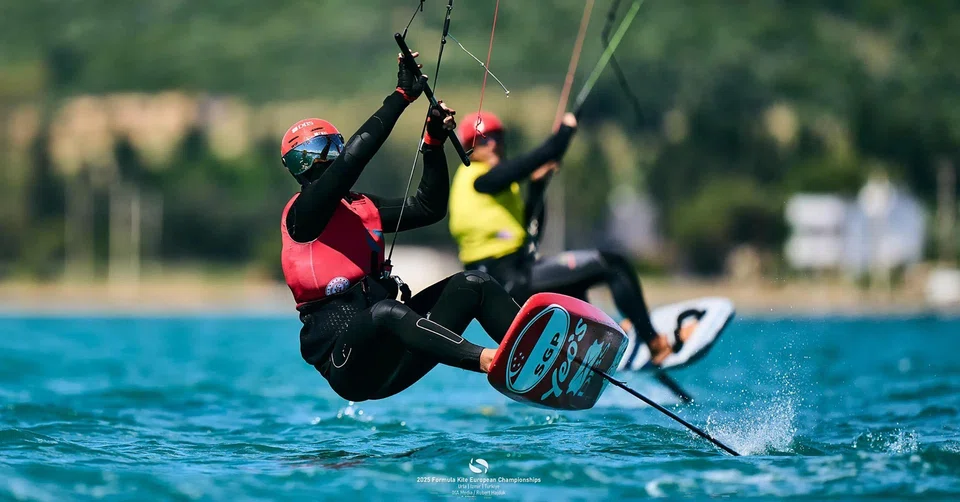 Singapore's Maximilian Maeder (in red vest) retaining his Formula Kite European Championships crown after defeating Riccardo Pianosi (in yellow vest) in the medal series on May 19.