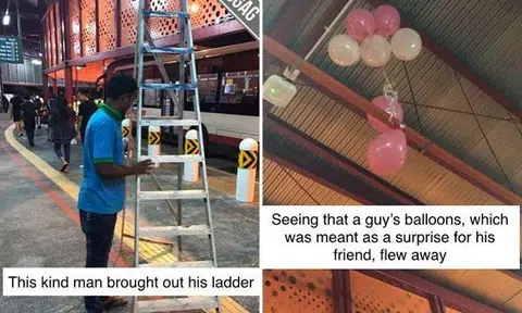 Worker brings out ladder to retrieve balloons from ceiling for man