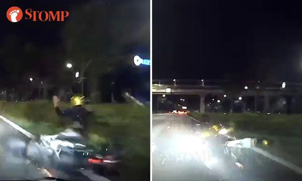 Motorcyclist falls and spins on road after accident with car along TPE