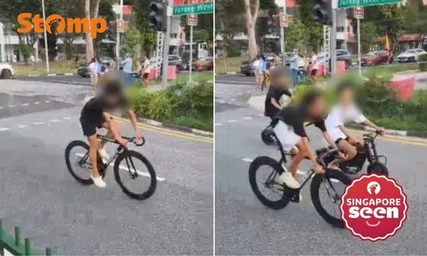 Oblivious to danger? Youths ride e-bikes and bicycles without helmets in middle of Jurong West road