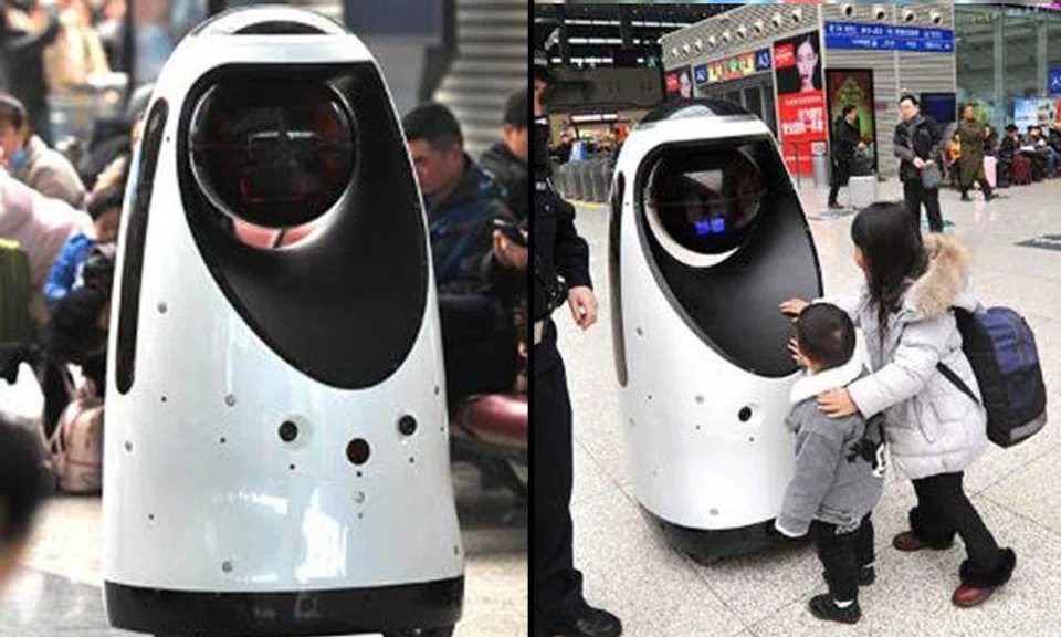 Cleaning bot? Nope, just your friendly RoboCop going on patrol in Zhengzhou railway station