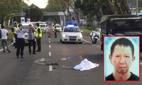 Wife in Malaysia watches husband's head get severed in accident while crossing road