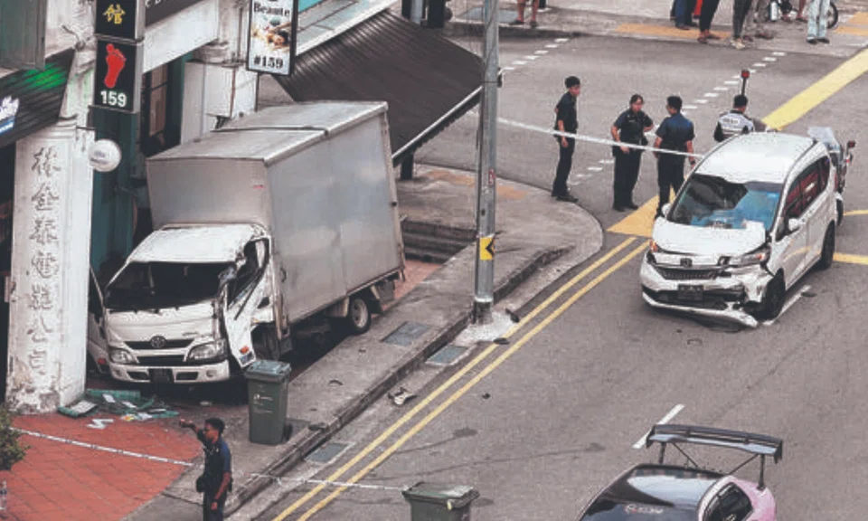 Witnesses claimed the lorry was speeding before crashing into the car.