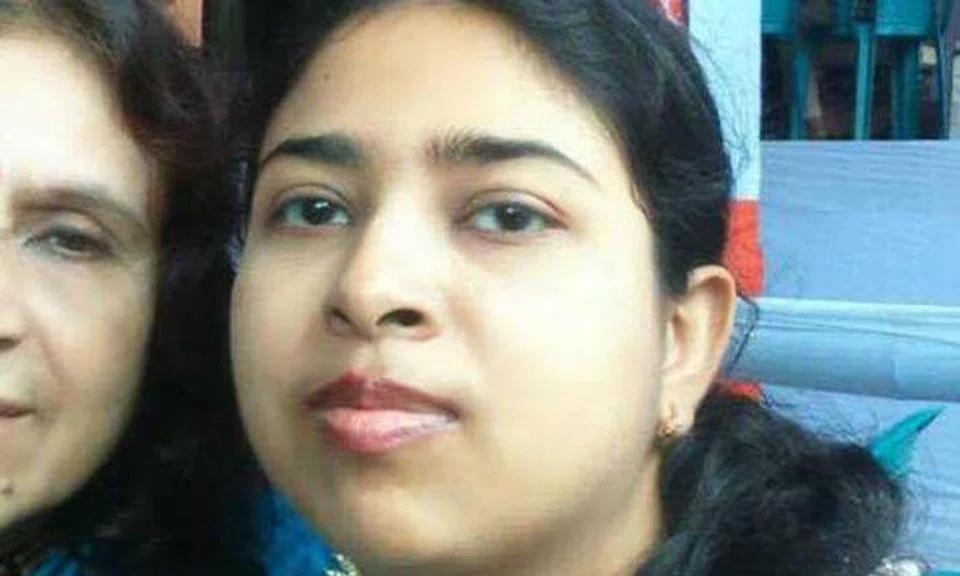 Sanjukta (right) is last seen at Marina Bay MRT Station. 