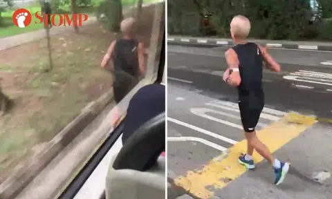 Man running dangerously close to bus on busy road in Pasir Panjang has shirt on this time