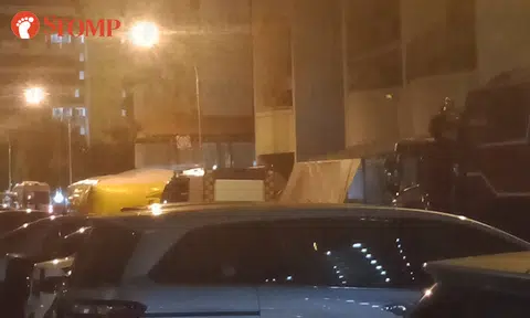 Man, 26, arrested after being brought to safety at Hougang HDB block
