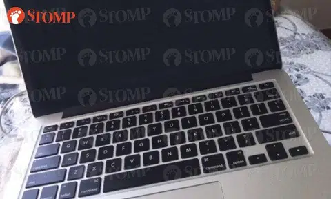 Woman looking for MacBook Pro at Bugis Junction’s toilet