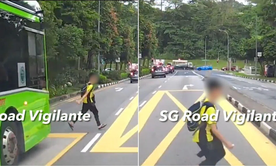 Boy sprints from behind bus and almost gets knocked down by oncoming vehicle