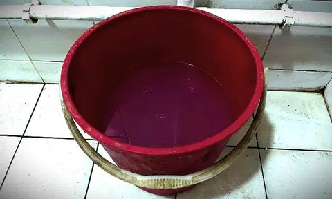 Man accused of pushing baby's head into pail of water, holding him up by his neck and other abuses