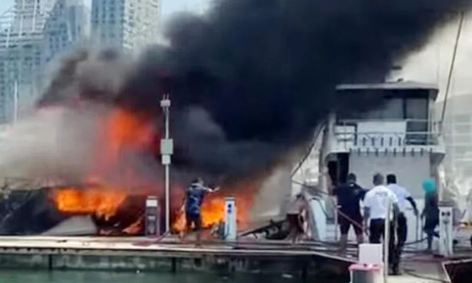 Moments after thick black smoke emerged from a burning yacht that was docked at Marina at Keppel Bay on Monday morning (May 30), some mechanics resting nearby saw boatmen from other vessels running towards the location to try and put out the flames. 