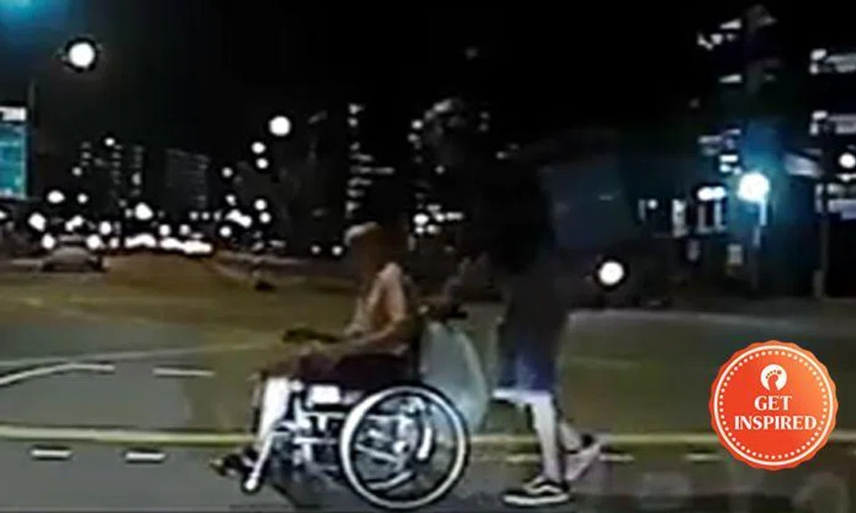Deliveroo rider stops at Tampines junction to help elderly man on wheelchair across road