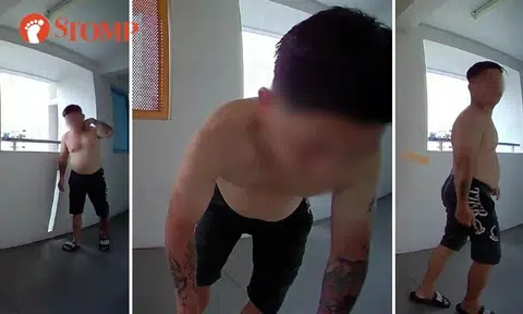 'Sus' shirtless man caught on camera outside Jurong West flat allegedly trying to take Stomper's parcel 