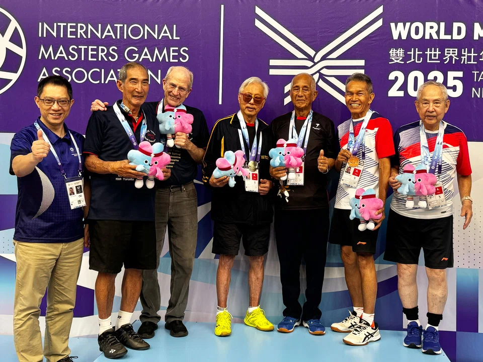 Susanto Halim (second from right), 80, won a badminton gold and bronze and says the event was a chance to test himself.
