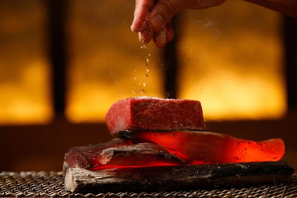Nikuya Tanaka Singapore's beef tataki is cured in kelp then briefly seared with binchotan.