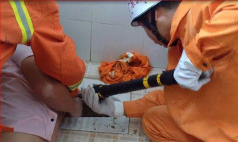 Chinese man spends crappy night with hand stuck in squat toilet trying to retrieve his phone