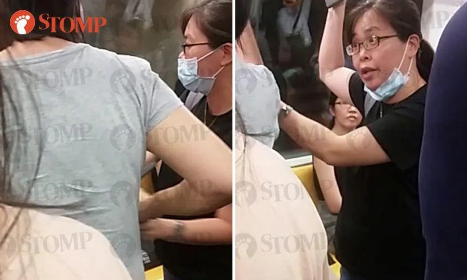 Woman demands compensation from MRT commuter during dispute, tells "false witness" to shut up