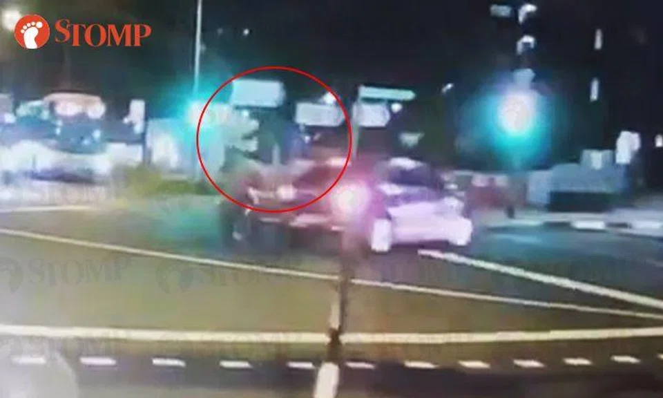 Food delivery rider sent flying from motorcycle after getting hit by car in Bedok