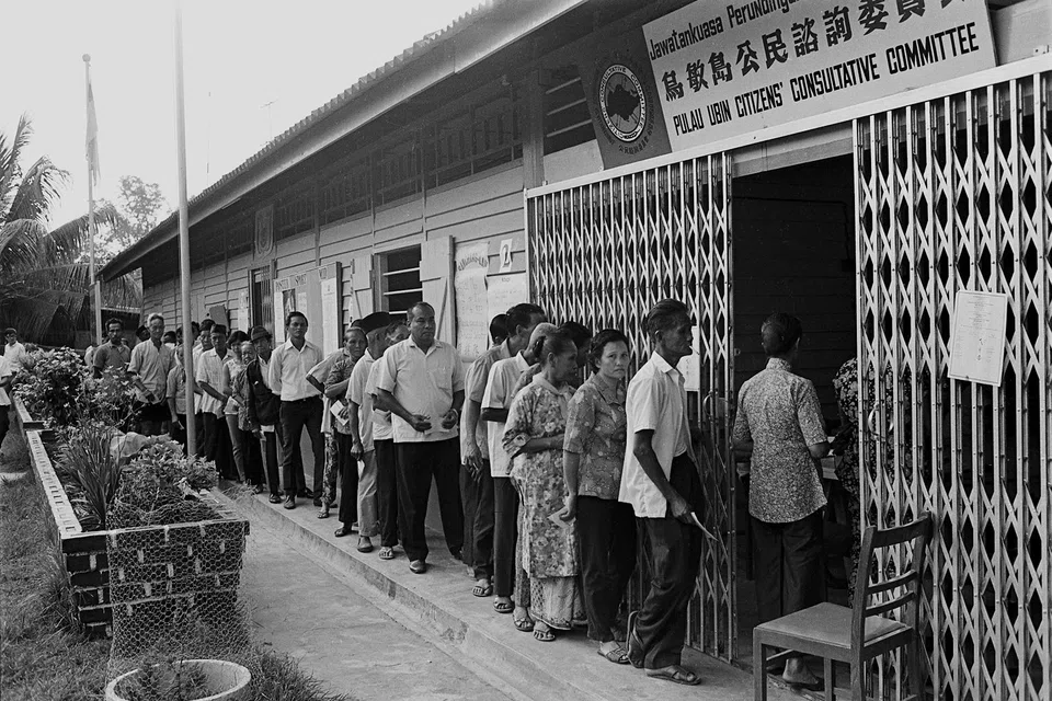 Residents of Pulau Ubin queuing up at the Pulau Ubin Community Centre polling station to cast their votes in the general election in 1972.