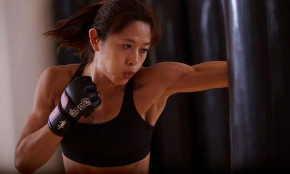 How S'porean national swimmer-turned-MMA fighter May Ooi is preparing for her big One Championship clash