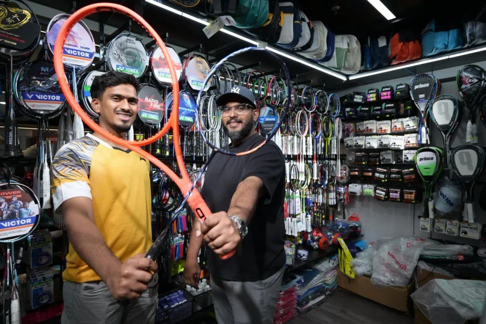 Smashsports' Mr Mohamed Hashim Marecar (left), 22, and his brother Mohaiyadeen, 35. The racket shop was started by their father in the early 2000s. 