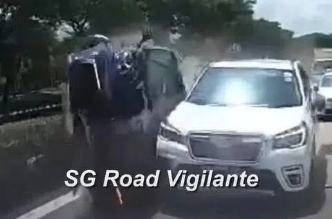 The Porsche hit two cars before flipping over and bursting into flames.