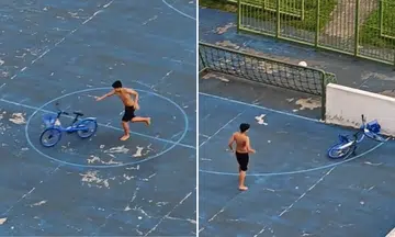 Boy rams Hello Ride bicycle into futsal court walls, lets it crash repeatedly