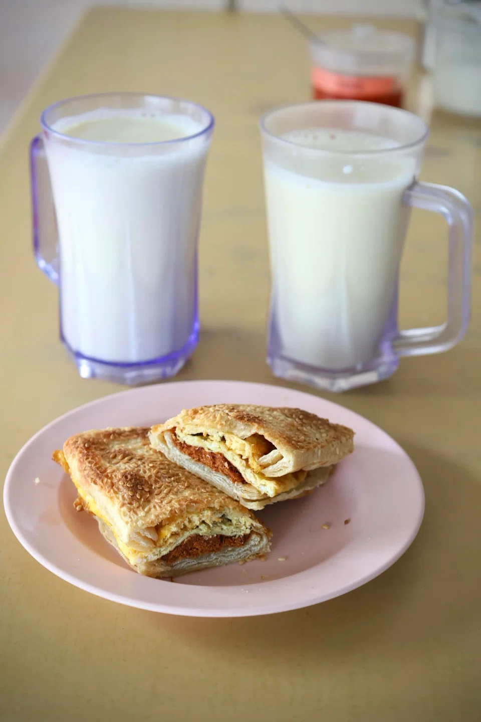 Sweet Soya Bean Drink and Toasted Bun With Meat Floss Egg at Yong He Eating House. 

ST PHOTO: HEDY KHOO