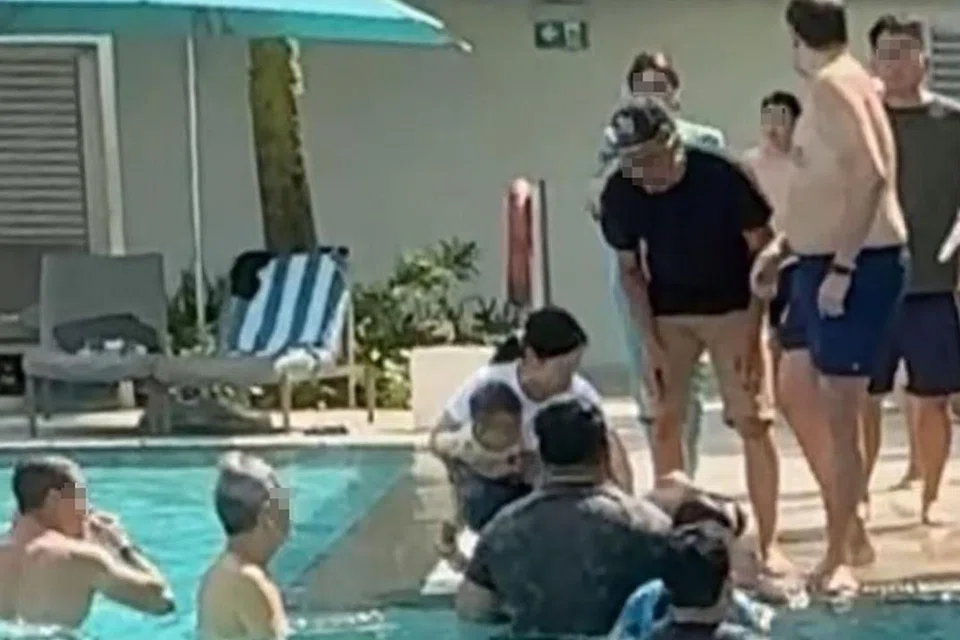 A witness identified the rescuer as a male tourist wearing a black shirt and a baseball cap. 