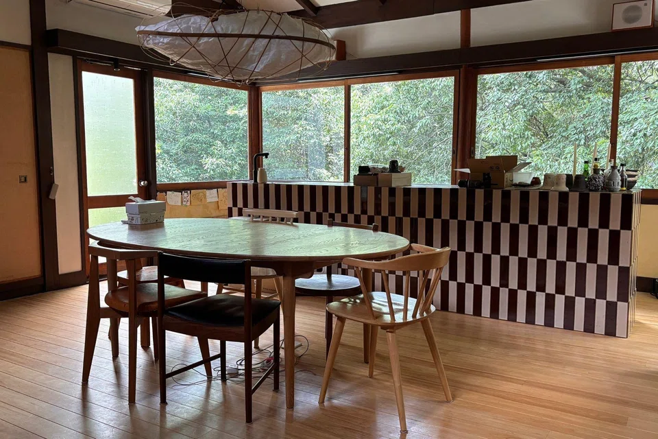 The living room has pieces of furniture both purchased and built from scratch.