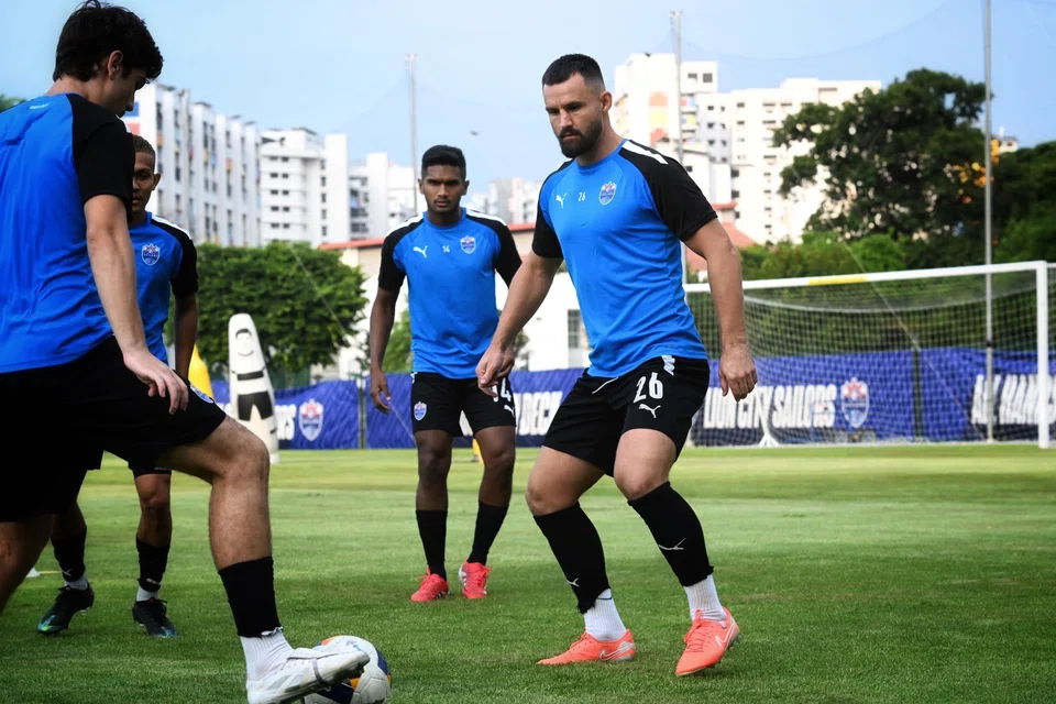 Lion City Sailors captain Hariss Harun and centre-back Bailey Wright at a training session on May 17.