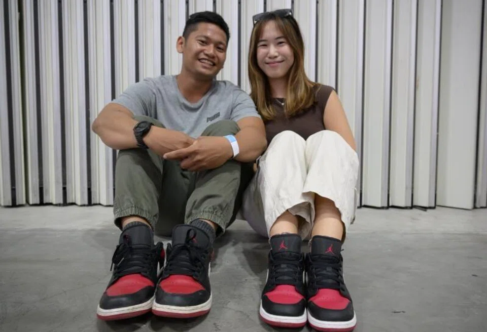 Mr Carl Iyog and Ms Sher Low with their matching Air Jordans.